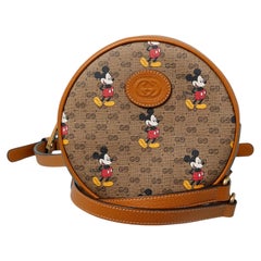 Mini round back-pack leather bag with Mickey print GUCCI