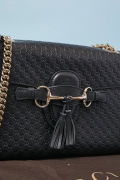 Black leather shoulder bag with monogram GUCCI