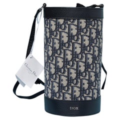 Leather and monogram canevas bottle holder bag on strap CHRISTIAN DIOR