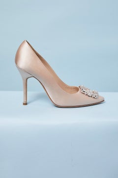 Pale pink satin pump with rhinestone embellishment MANOLO BLAHNIK