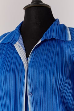 Blue pleated coat and dress ensemble ISSEY MIYAKE