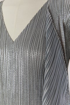 Grey silver pleated dress and coat ensemble PLEATS PLEASE