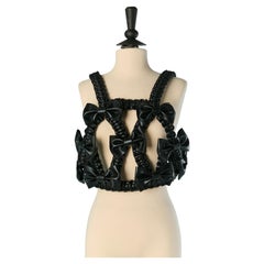 Black Faux leather backless top NOIR by KEI NINOMIYA & COMME DES GARCONS