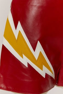 Red leather short with eclair leather appliqué CHRISTIAN DIOR Haute-Couture 2001