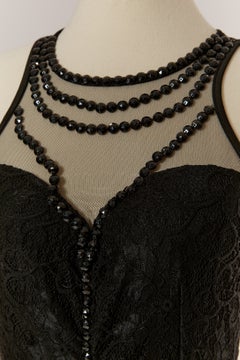 Black lace sleeveless evening dress with black rhinestone D&G by DOLCE & GABBANA