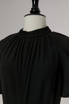 Black jumpsuit with lace back YVES SAINT LAURENT