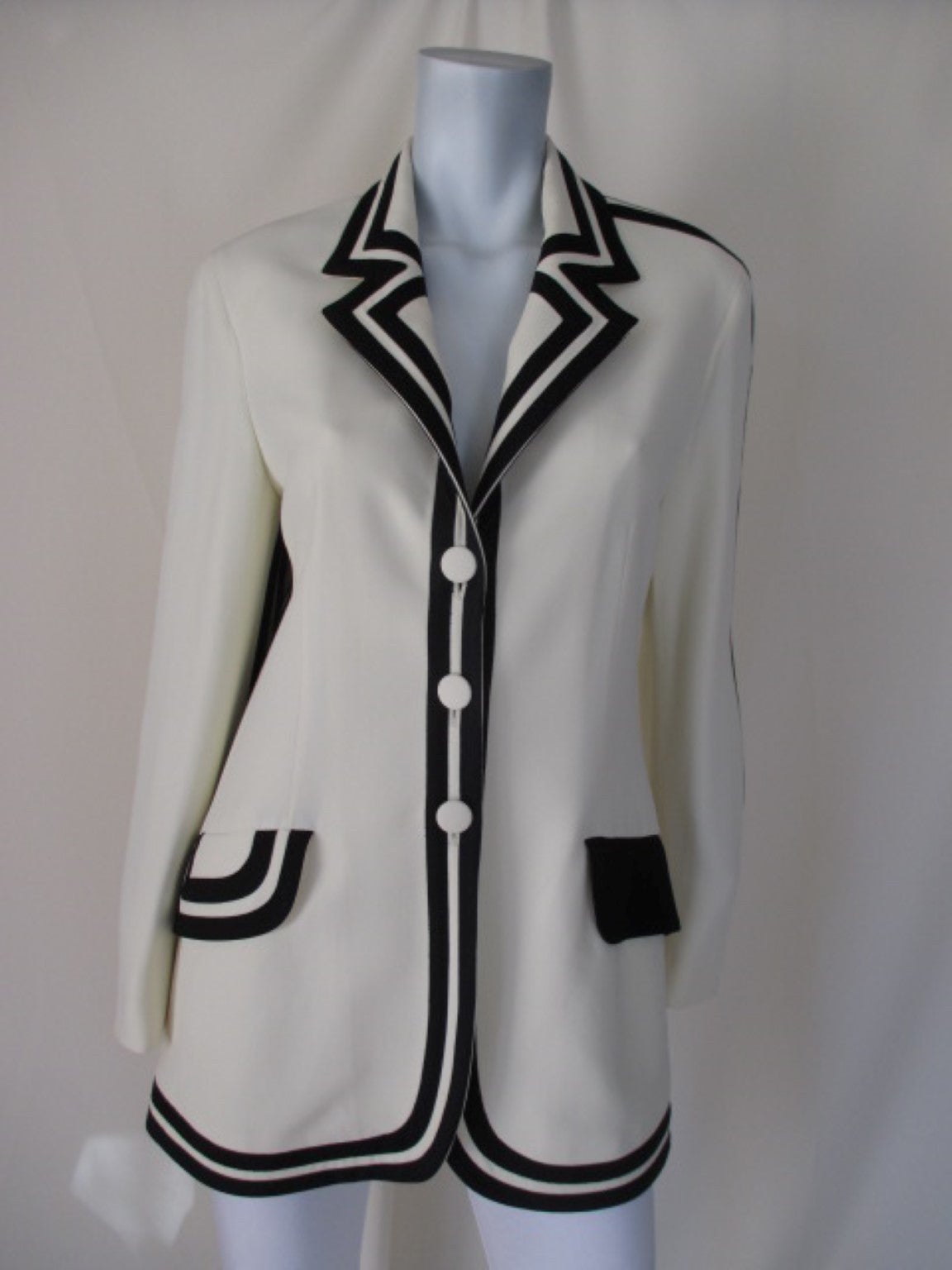 white coat with black trim