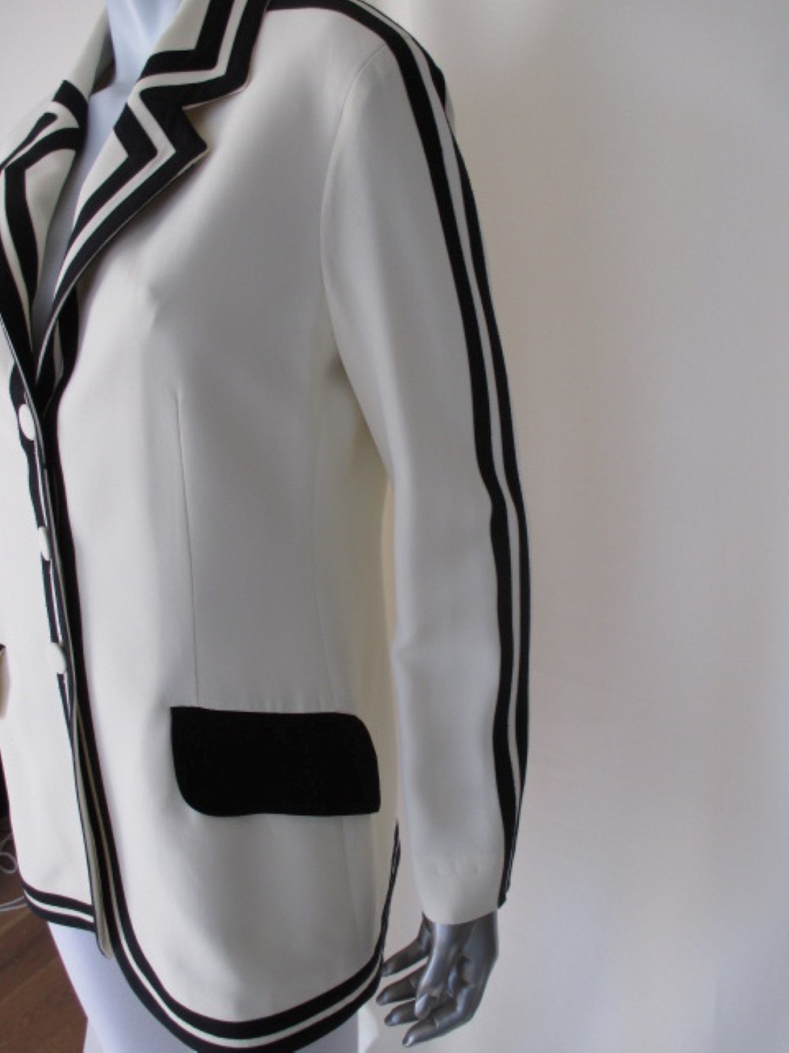 white blazer black trim