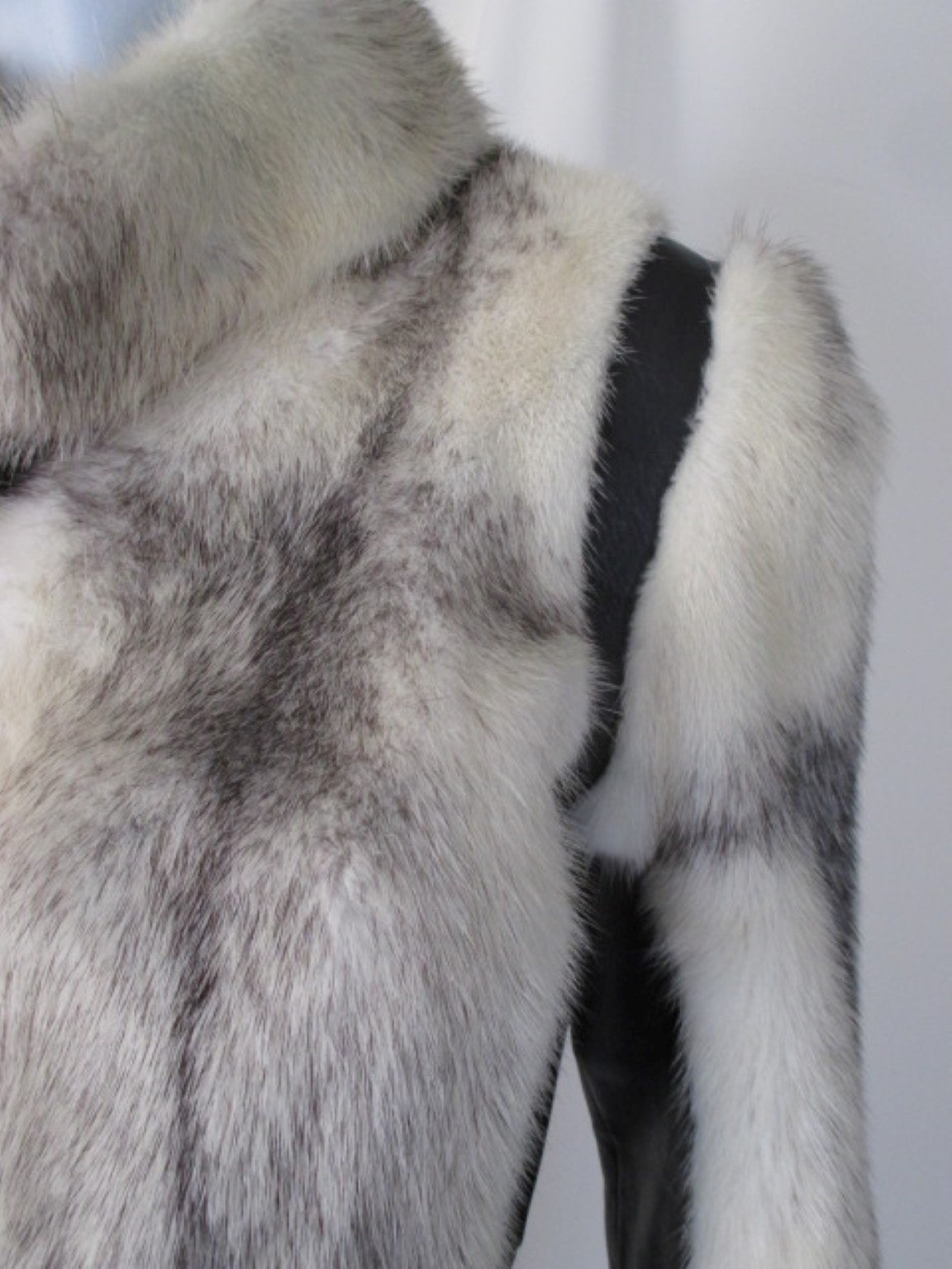 Exclusive belted cross Mink fur jacket with black leather details