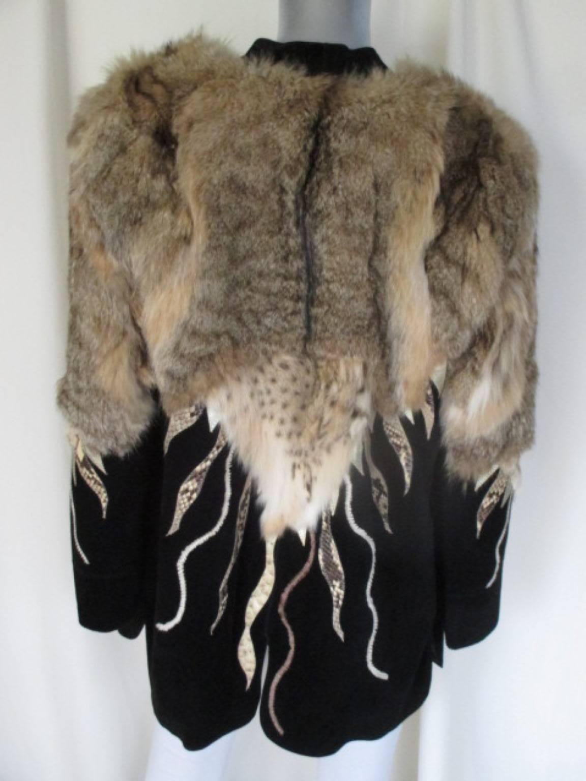 This is an unique vintage piece with beaded embroideries in the front and back side made from soft suede leather with snake and fur details.
This coat has 2 pockets and closes with 3 ties.
Size fits like EU 40
Please note that vintage items are not