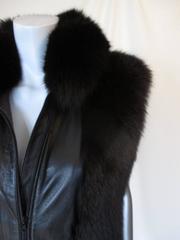Black leather sleeveless vest with black fox fur collar