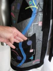 sleeveless reversible art leather/ black persian lamb fur vest