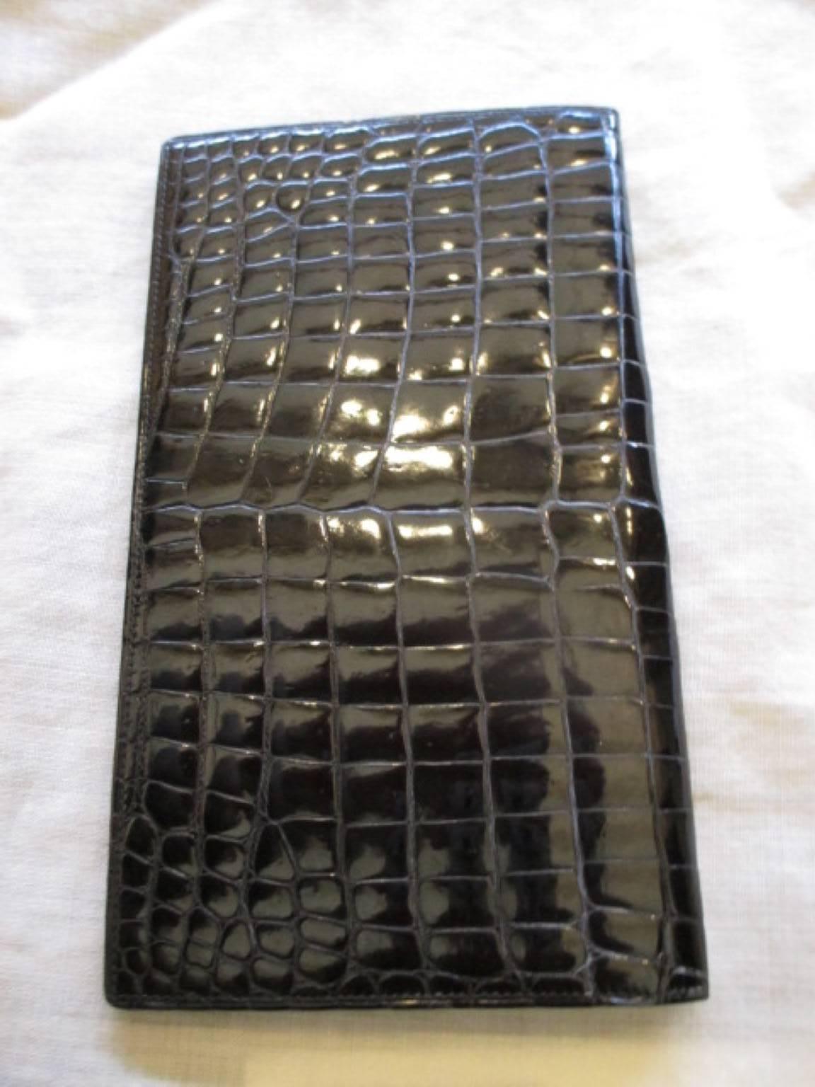 Schwarzes gucci-Wallet aus Krokodilleder für Damen oder Herren
