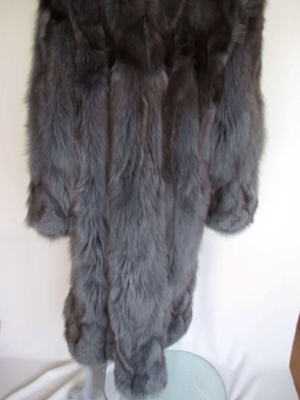 Black excellent soft and supple long fox fur coat