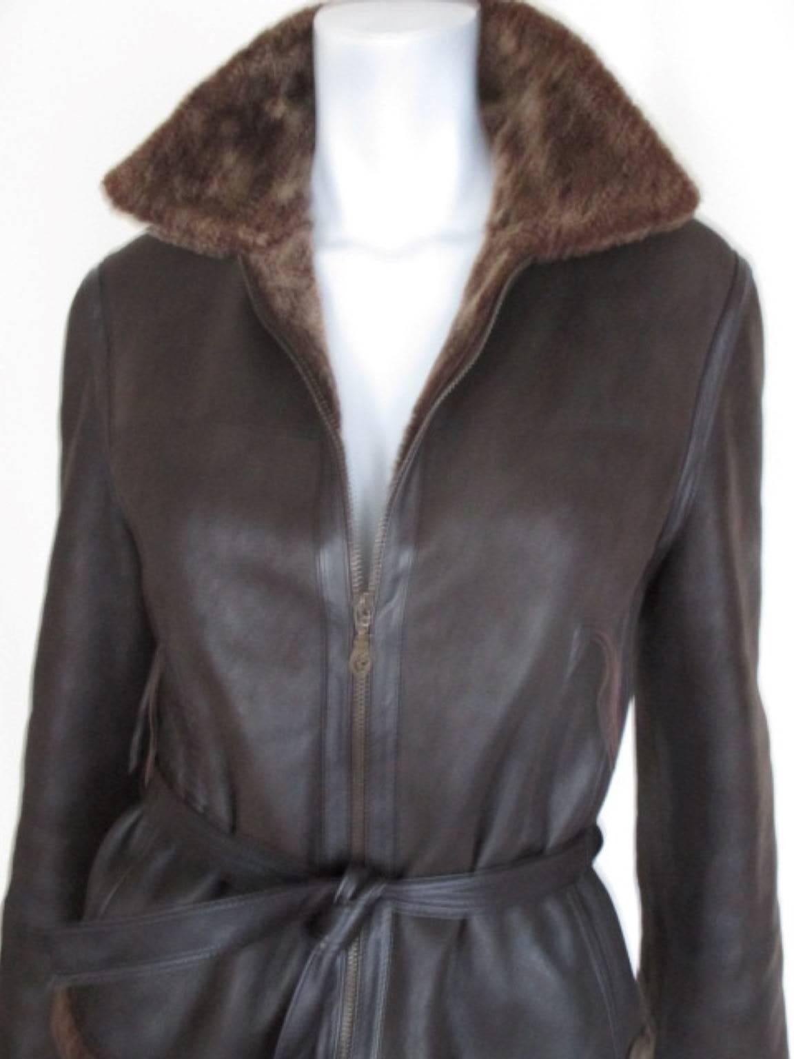 This jacket is made of quality shearling is soft and supple and light to wear.
It has a leather belt, zipper closing and 2 pockets with a zipper.
Size is marked EU 38 is about US 8.
Please note that vintage items are not new and therefore might have