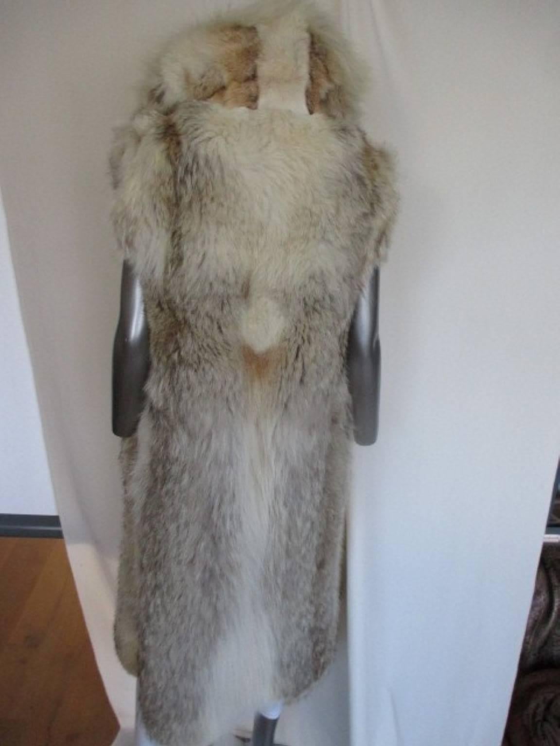 Gray sleeveless wolf fur vest