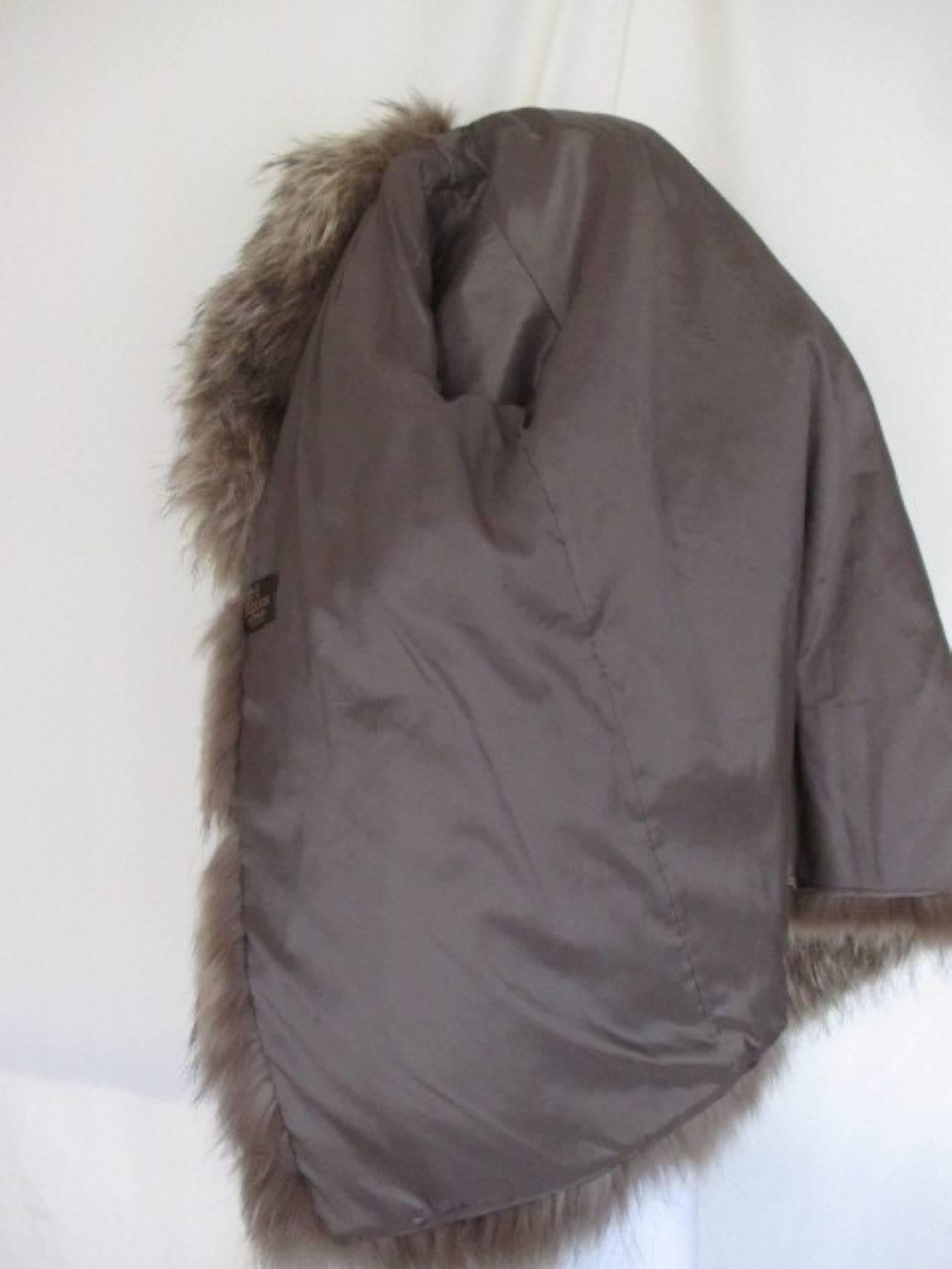 Gray natural finn raccoon fur coat