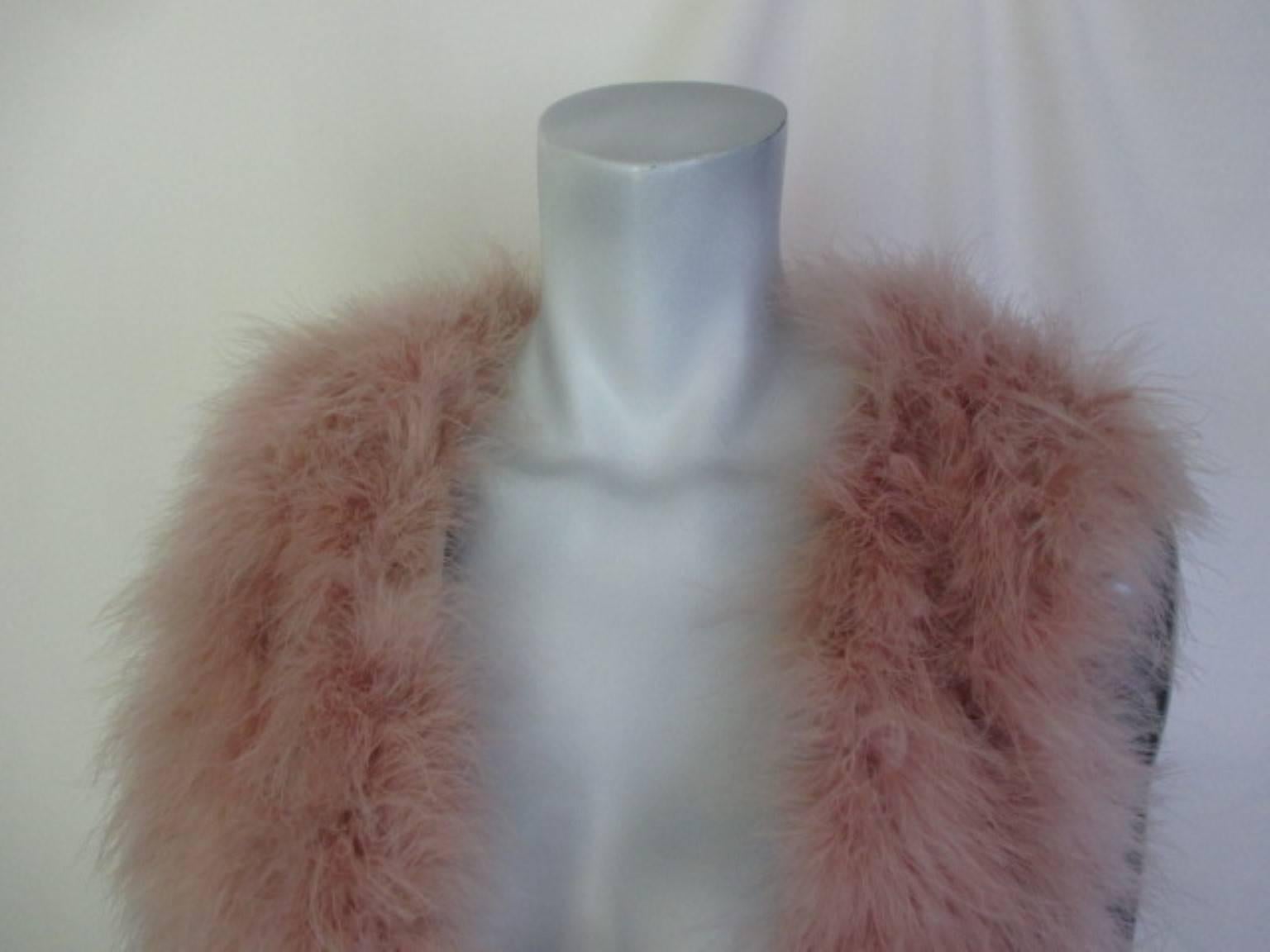 This vest is made of soft pink dyed marbou 
designed by Manila Grace
no pockets
Size US 8/ EU 38-40

Please note that vintage items are not new and therefore might have minor imperfections.
