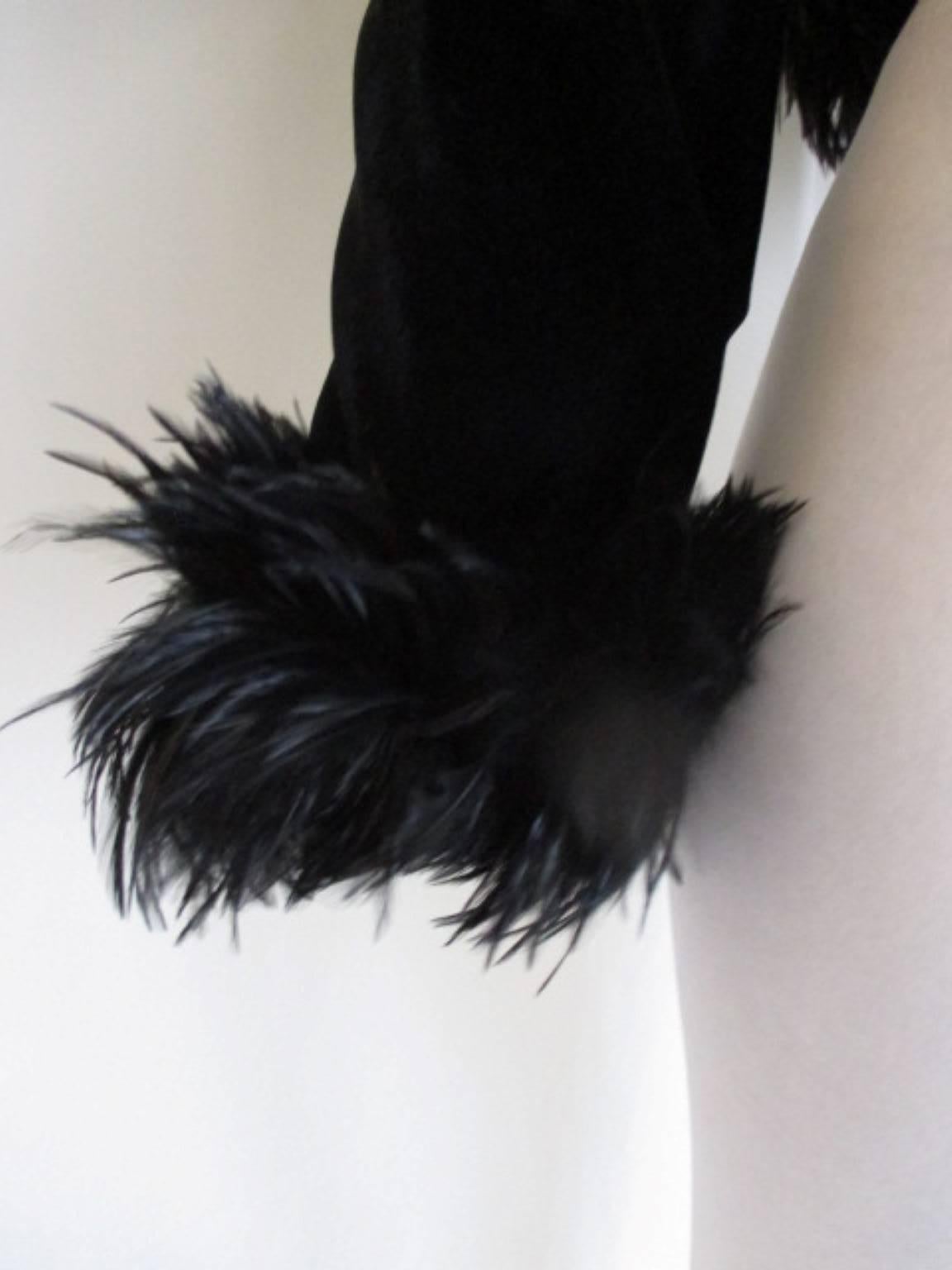 This unique piece of Escada Couture bolero is made of velvet and trimmed with hard feathers.
Its in pre-loved condition.
Size mentioned EU 40 but can be fitted US 8-10, see section measurements.

Please note that vintage items are not new and