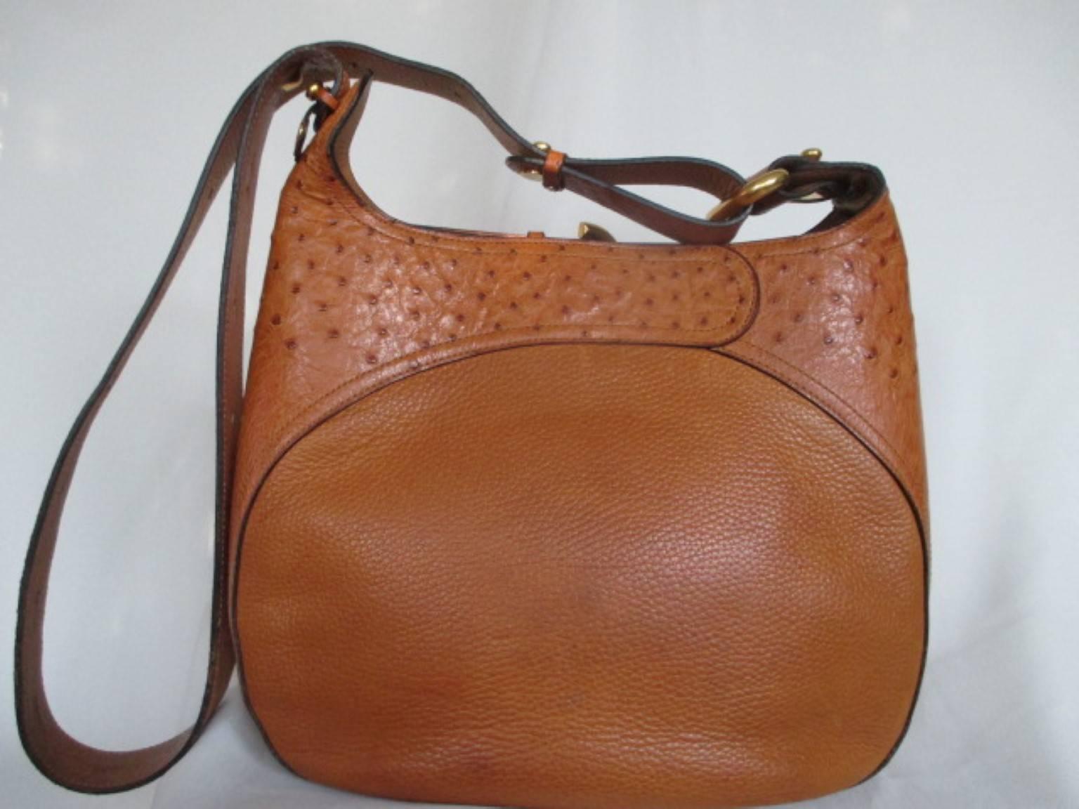 Rare vintage Delvaux ostrich/leather shoulder bag. 
Delvaux bags in ostrich leather are very rare, with a long waiting list as the bags are handmade in Belgium, Europe. 
This bag is made of crème/brown leather and ostrich with gold hardware, can be