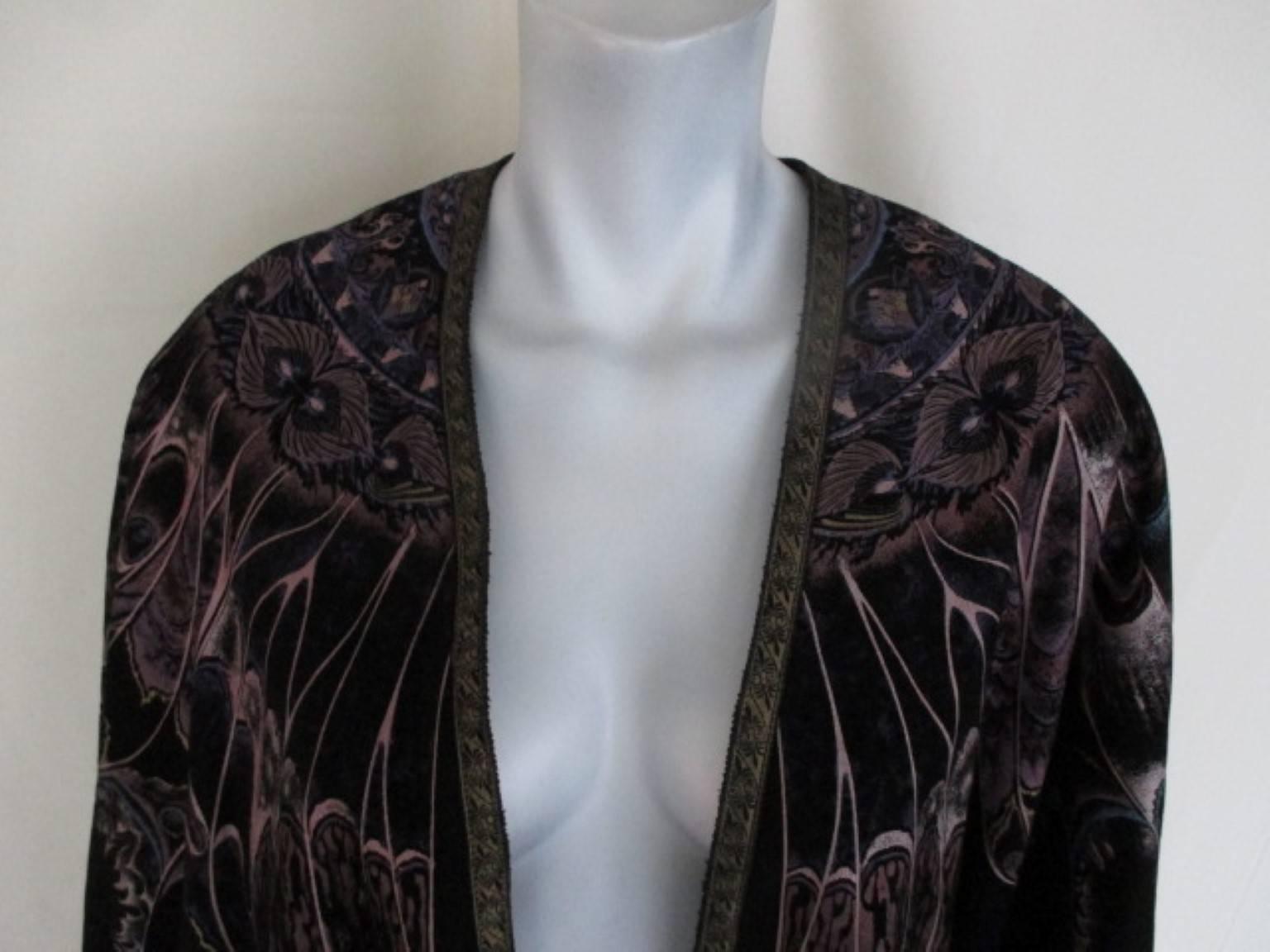 Very few 1970's Roberto Cavalli leather capes of this period turn up for sale.
The under layer is black velvet with on top the suede print piece.
The condition of this cape is excellent. There are a few natural flaws in the suède that may have been