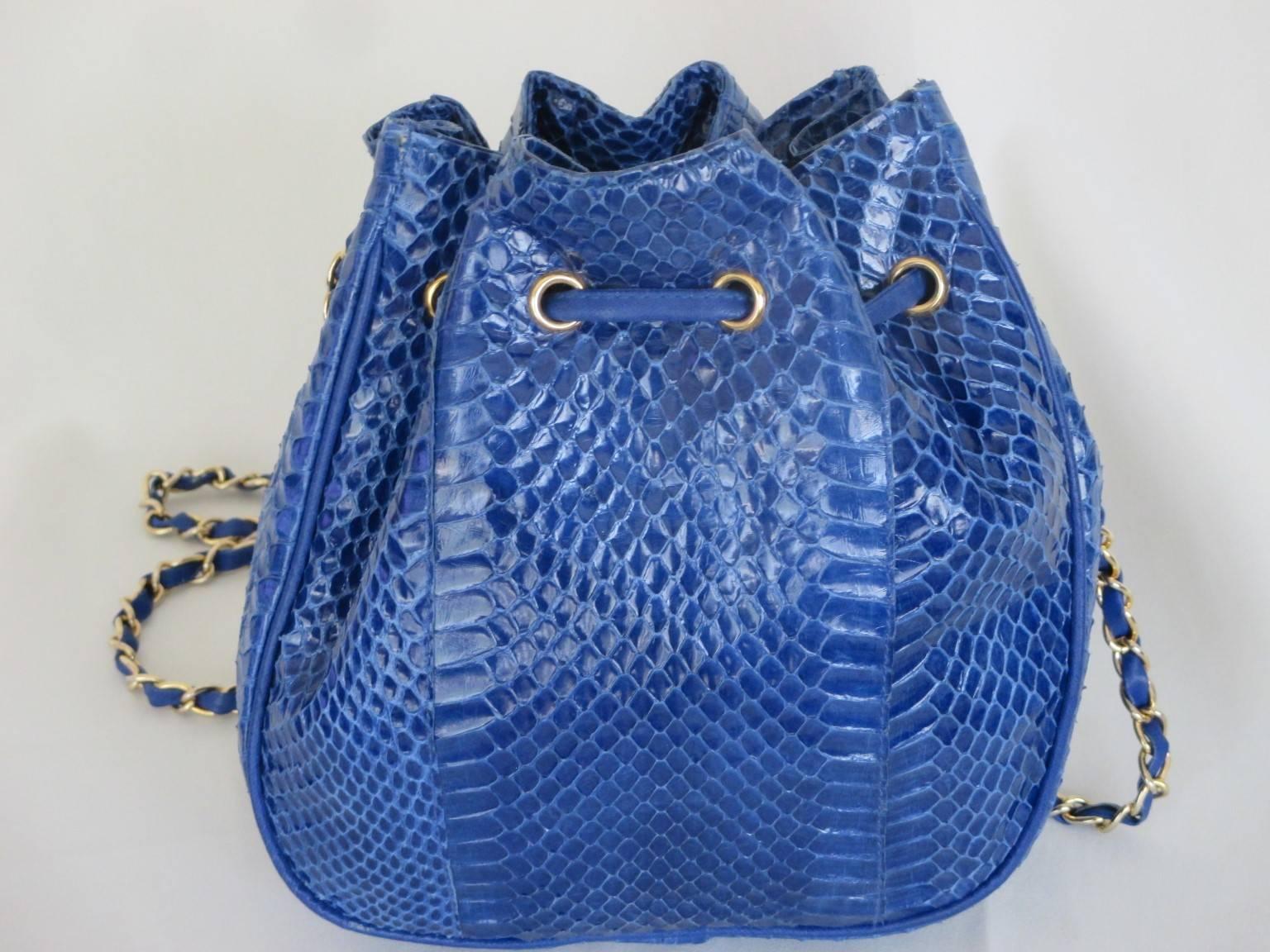 This bag is made from very soft dyed blue python leather.
Fully leather lined with internal zip
The size of the shoulder strap is 135 cm
Size is 21 cm x 22 cm x 9 cm
Please note that vintage items are not new and therefore might have minor
