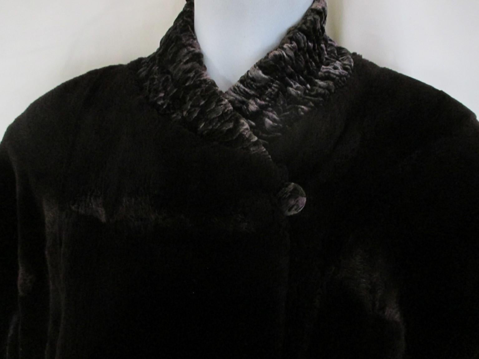This cape style jacket is made of soft sheared mink which is reversible and can be worn from both sides.

We offer more exclusive fur items, view our fronstore.

Details:
One side is sheared mink and the other side soft velvet with flowers