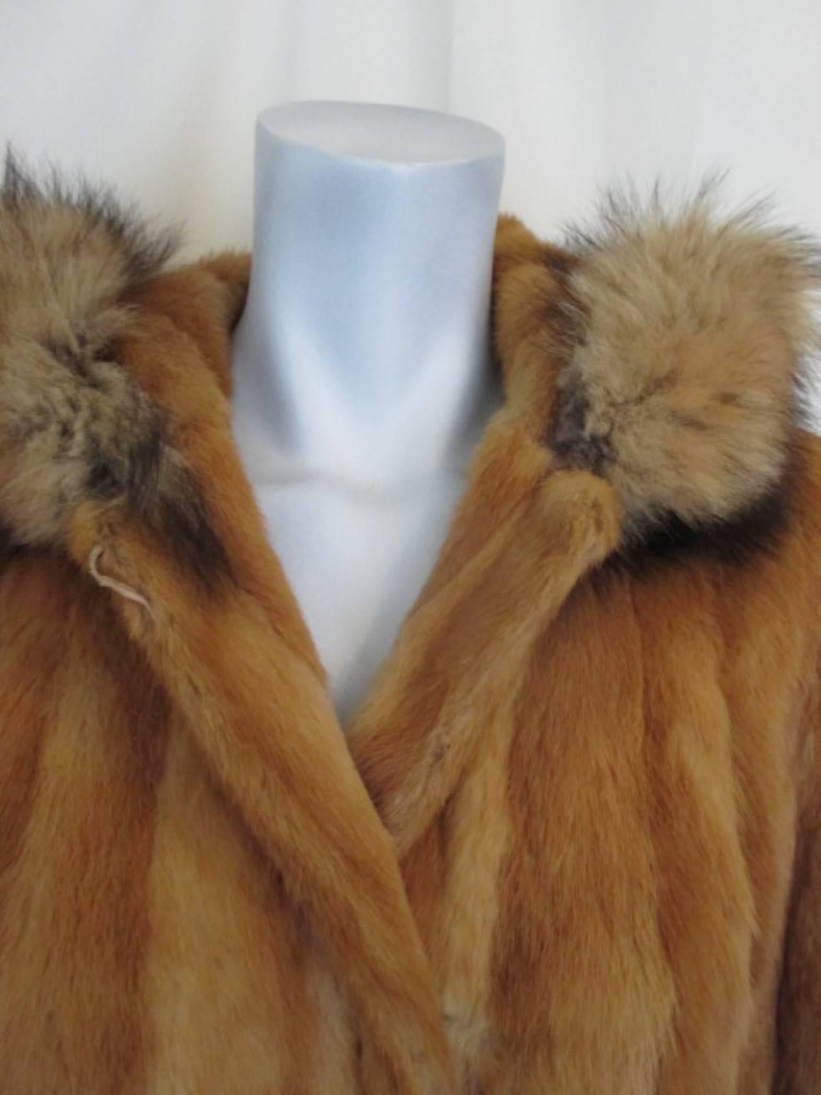 Brown exclusive hooded fur coat with fox ruff 