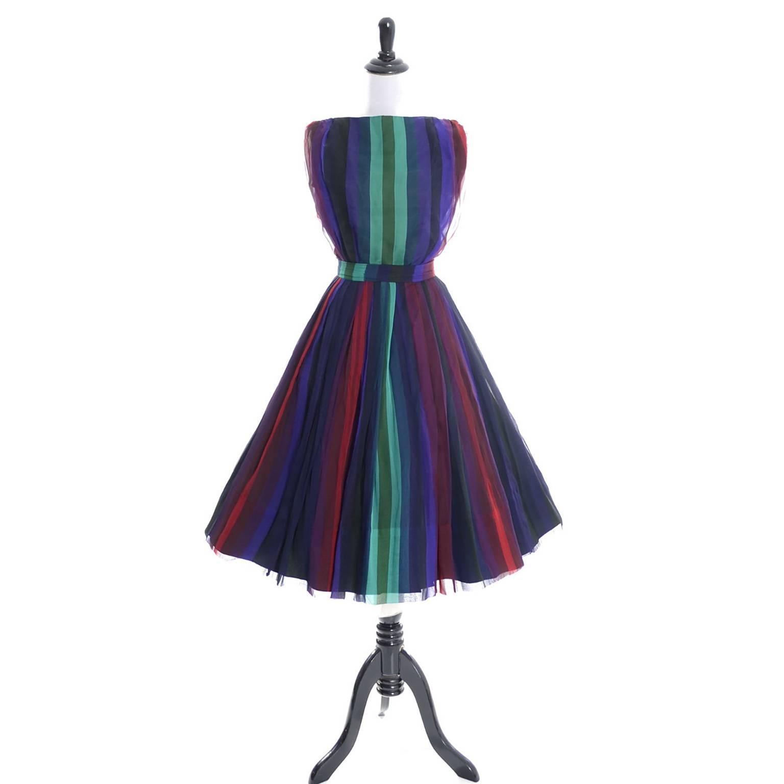 This dreamy silk chiffon striped vintage dress by Nathalie California was purchased at Bullock's in Los Angeles in the early 1960's.This vintage 2 pc dress has a full pleated skirt with a metal zipper, hook and eye and snap closure, and a sleeveless