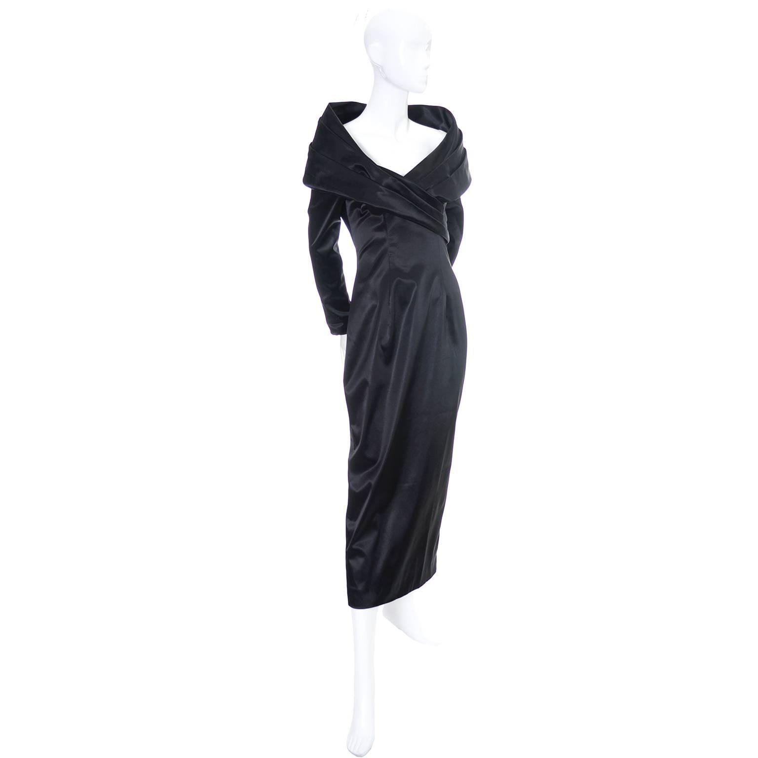 This incredible Sophie Sitbon black dress has a dramatic shawl collar that sits just on the edge of the shoulders to reveal the décolletage. The dress was made in France in the 1990's and is made of 65% Acetate, 29% Polyamide Nylon, and 6%