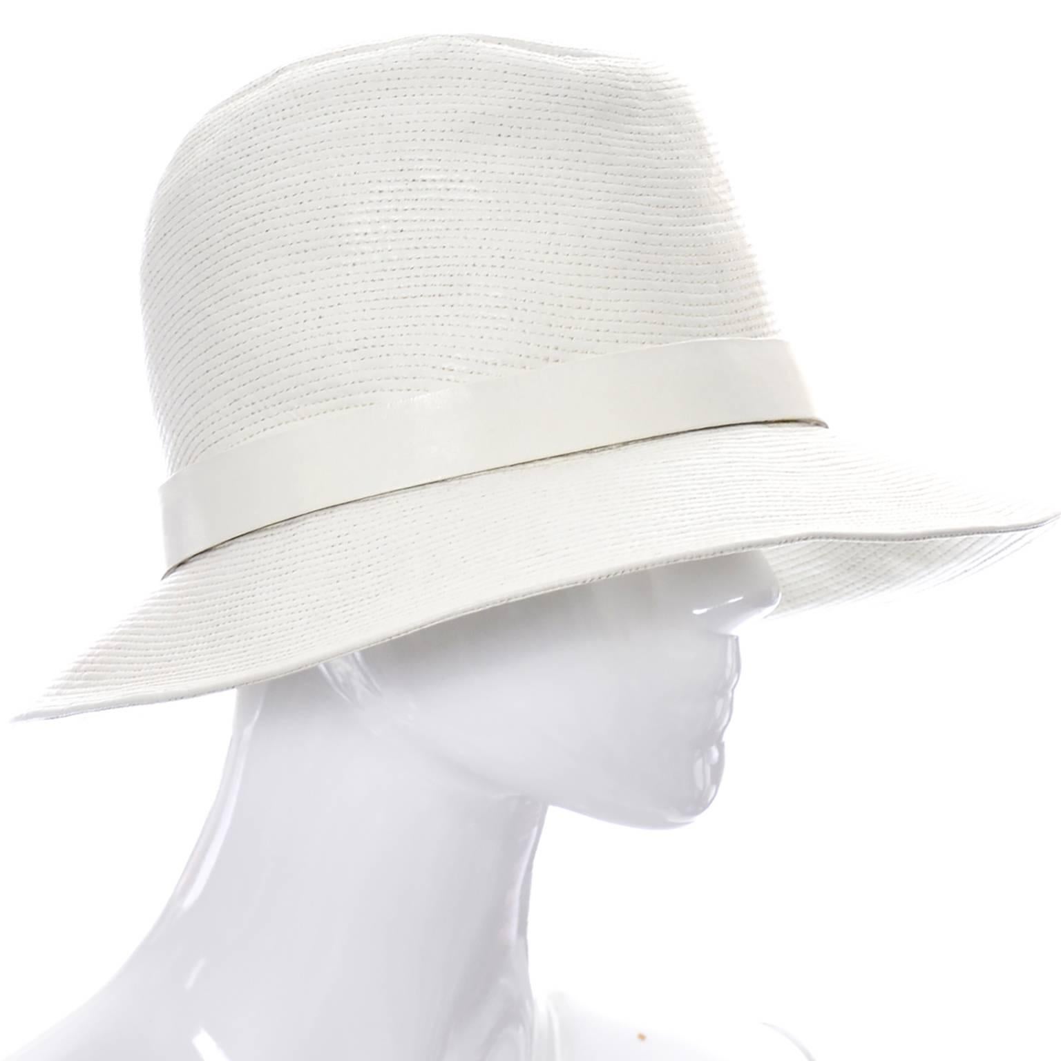 This topstitched ivory leather vintage hat was made in France exclusively for Lord & Taylor Salon in the 1970's.  This comes from an estate of the most impressive collection of vintage designer clothing I've ever handled.  Everything this woman