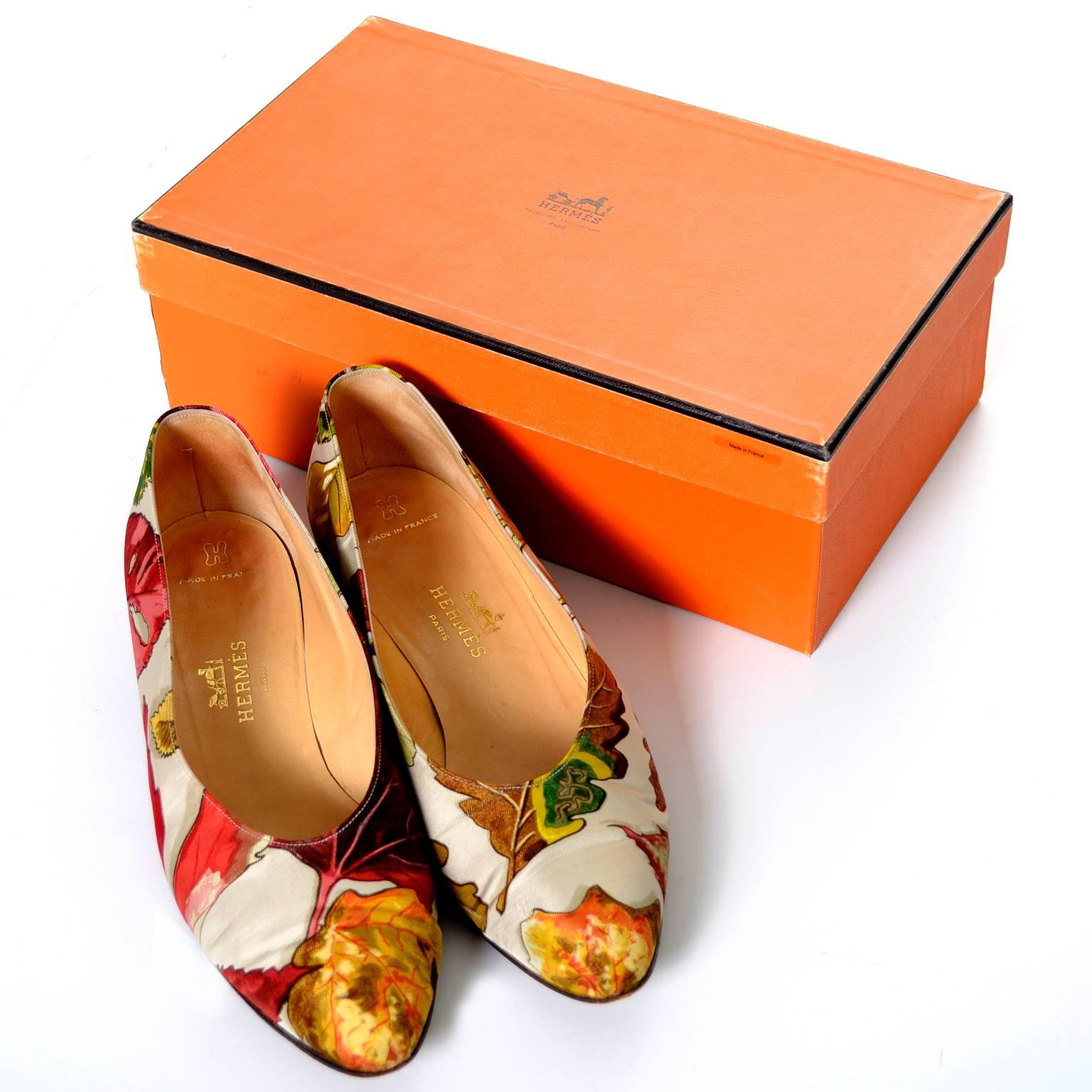These fabulous vintage Hermes shoes are made in a scarf leaf print fabric and still have their original boxes. These shoes have semi pointed toes and are labeled a 37 and 1/2 B, or approximately a US size 7B.  There are only minor scuffs on the