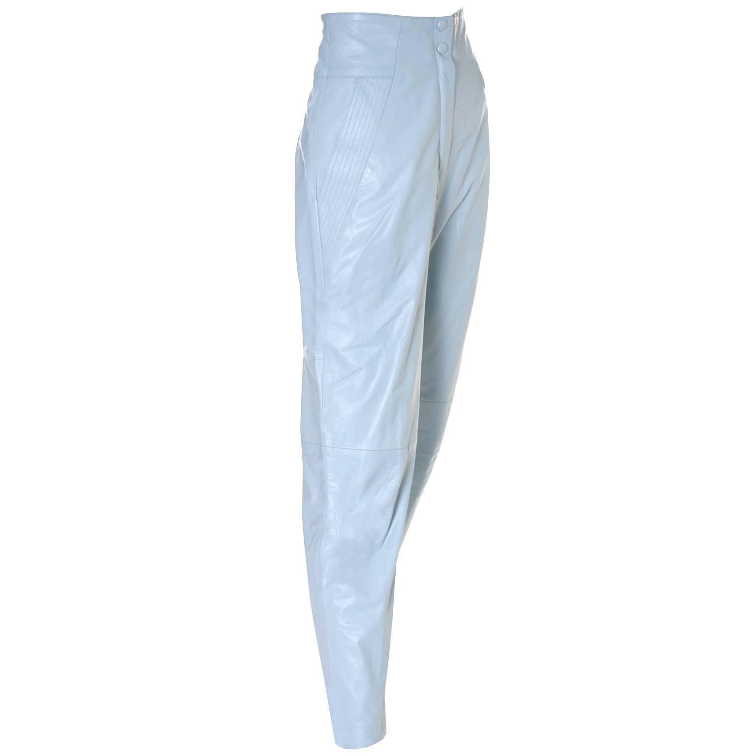These great blue vintage Lillie Rubin leather pants were made in Israel in the 1980's. The pants are lined and have side slit pockets with nice top stitching detail and a front zipper and snap closure.  They fit like a cropped pant with really cool