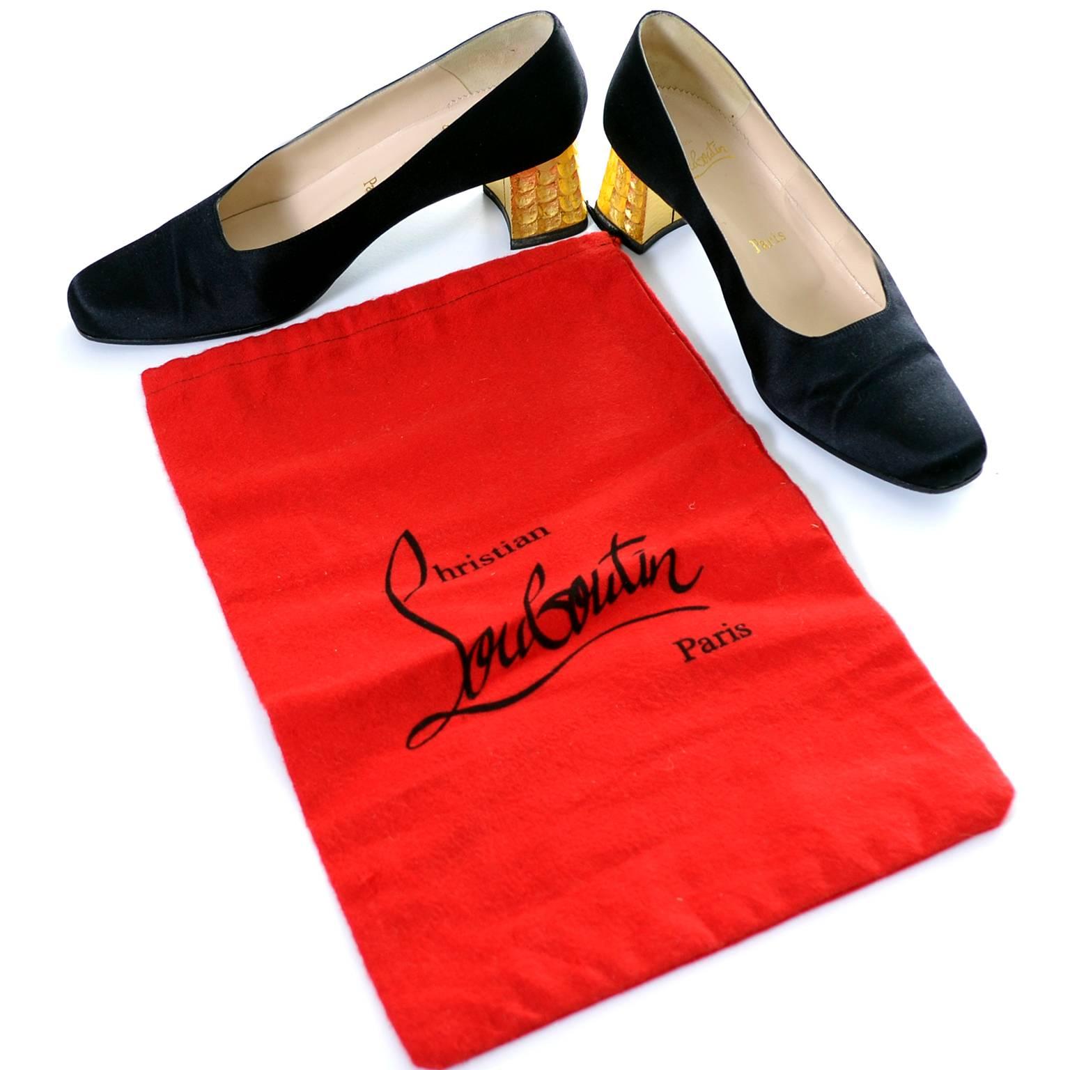 These are important black satin vintage shoes with gold leaf heels from Christian Louboutin.  Made in Italy in 1992, I am fortunate to have 2 different magazine documentations that show the shoes as part of fashion spreads.  These shoes have their