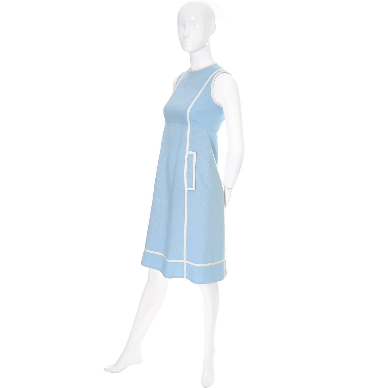 This is a beautiful, classic, 1960's vintage blue linen sleeveless dress designed by Geoffrey Beene. The dress was purchased at the department store Meier and Frank in Portland, Oregon in their high end 