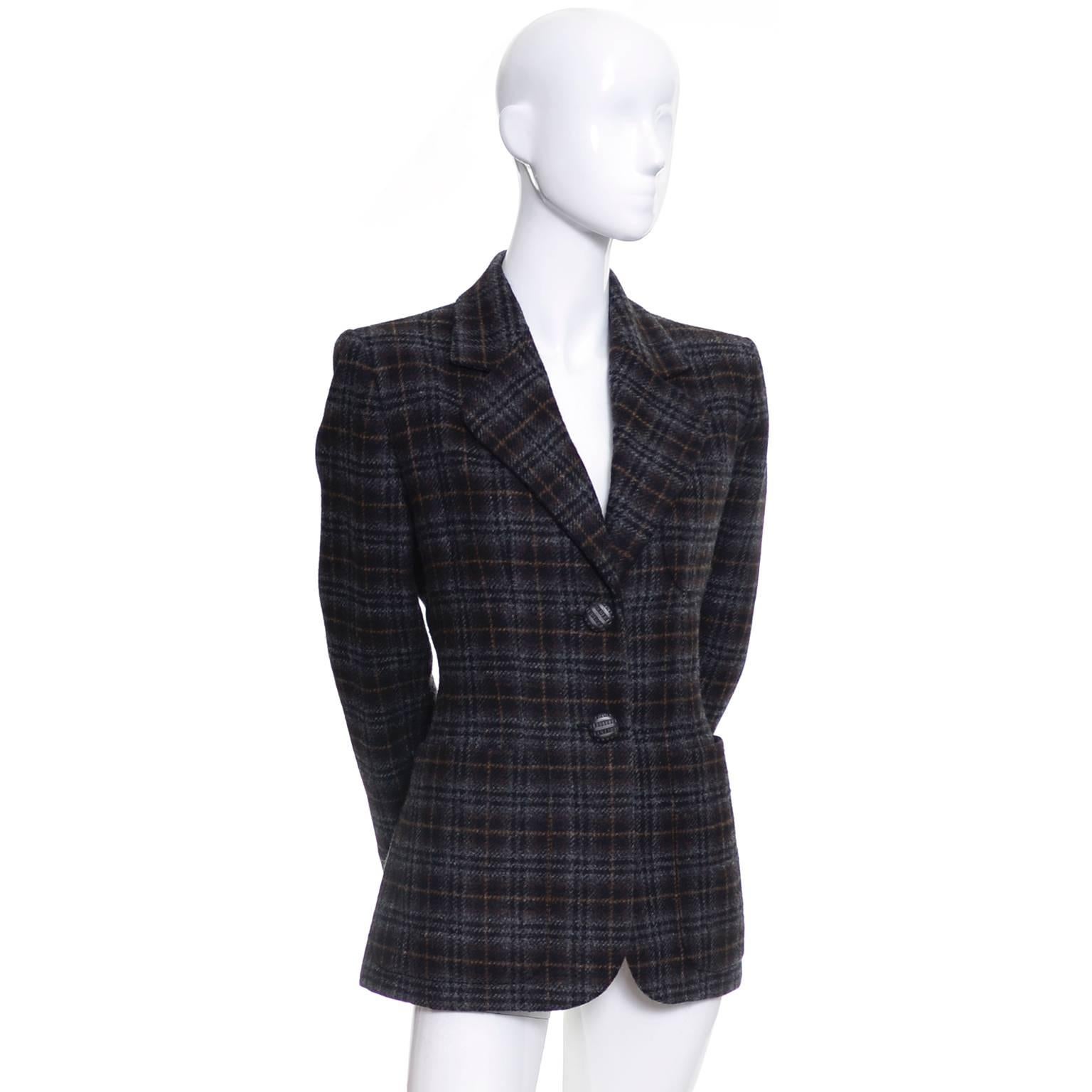 This classic YSL vintage wool blazer is in as new condition and was made in France in the early 1990s.  This jacket is lined and has 3 front pockets and shoulder pads. It is labeled Yves Saint Laurent Rive Gauche size 42 (US 10), but please use the