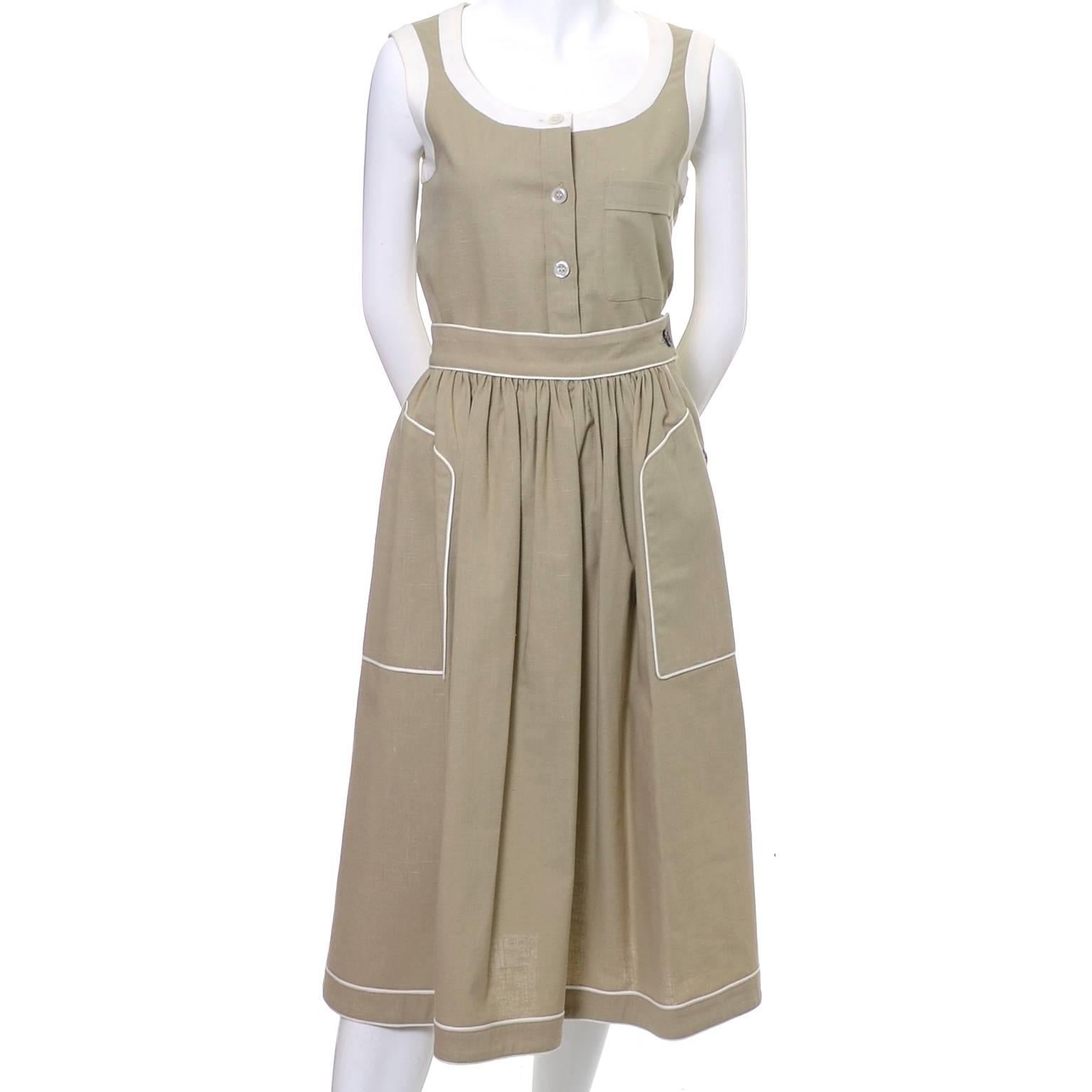 This vintage Valentino two piece linen dress is in as new condition and was made in France in the 1970's. This came from one of our favorite estates of all time and the original owner took such good care of her collection. The outfit has a scoop