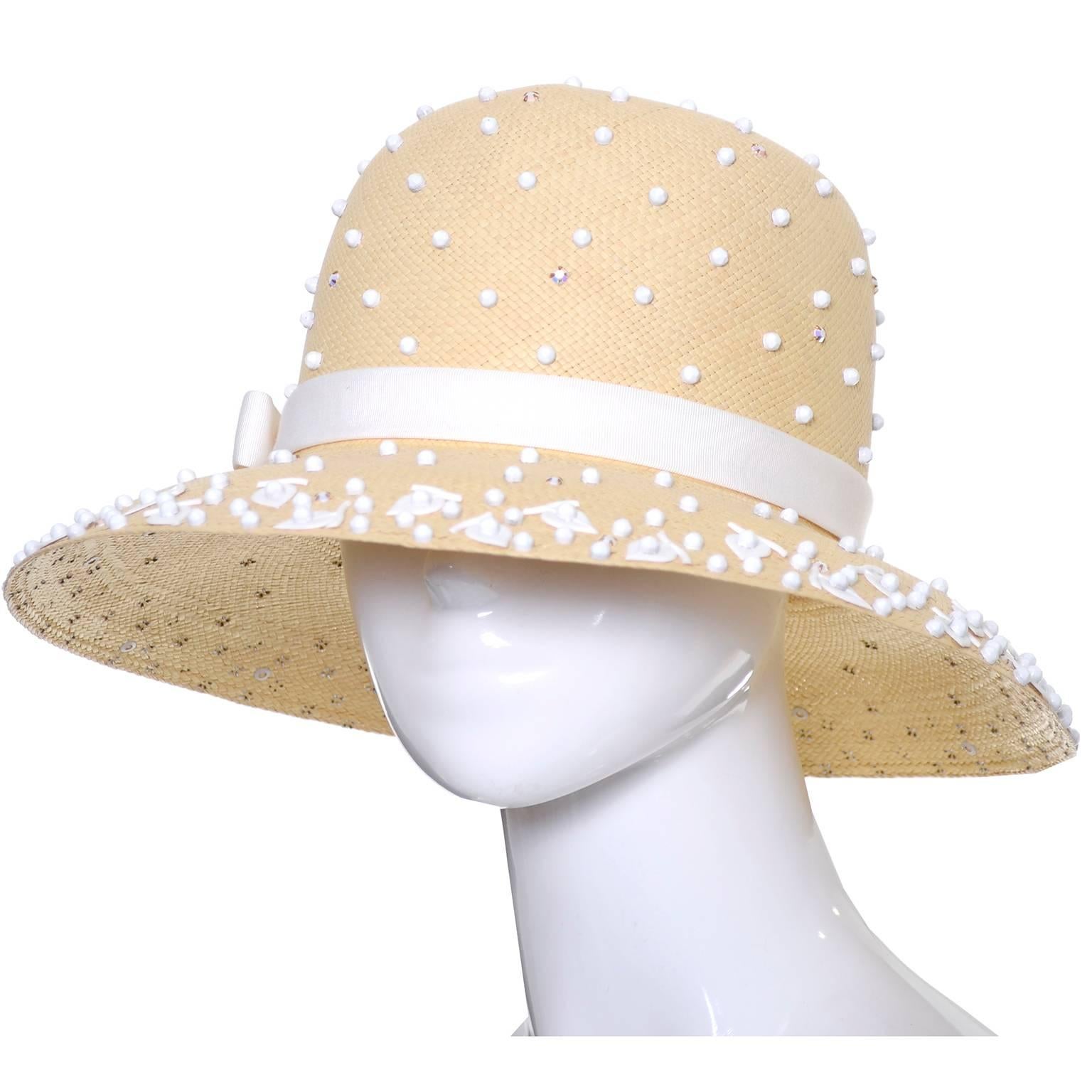 This dead stock Kurt Jr. vintage hat was designed by Tom Hann and still has both its manufacturer tag and Nordstrom price tag attached!  The hat is from the 1960's and sold for $50 at Nordstrom at the time!  This fine straw hat is beaded with
