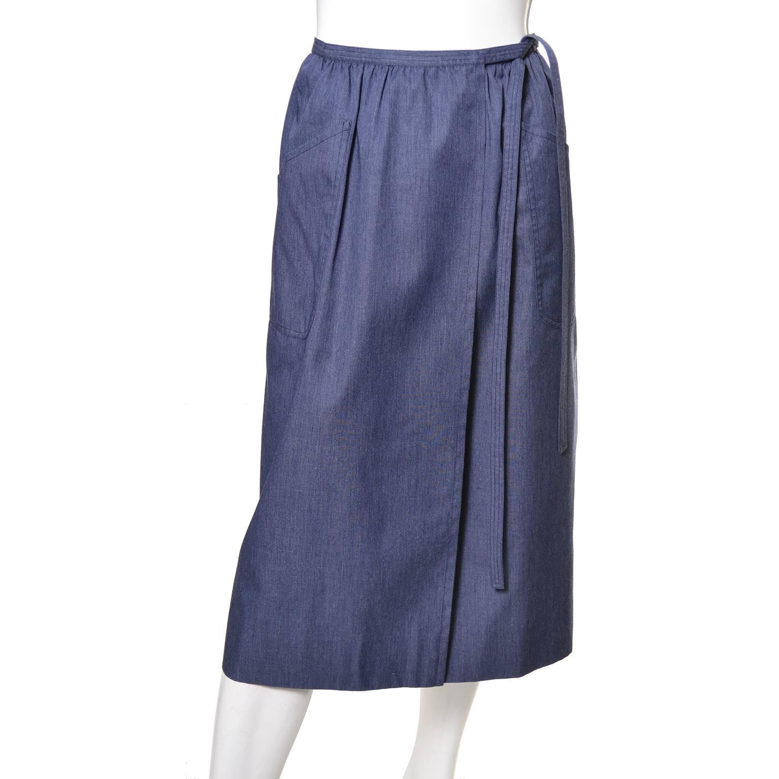This is another vintage YSL piece from an estate of vintage Yves Saint Laurent clothing from the 1970's and early 1980's.  This pretty chambray skirt has pockets and connects with 2 hooks and eyes, with the appearance of a wrap skirt.  This skirt,