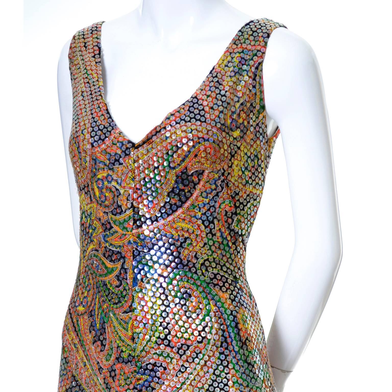 This fab vintage dress was made in paisley, lined in stretch jersey and is covered with sequins.  The dress was custom made in the 1970's and has a back zipper and low V neckline.  I would estimate this to be a modern day size 8/10 but please use