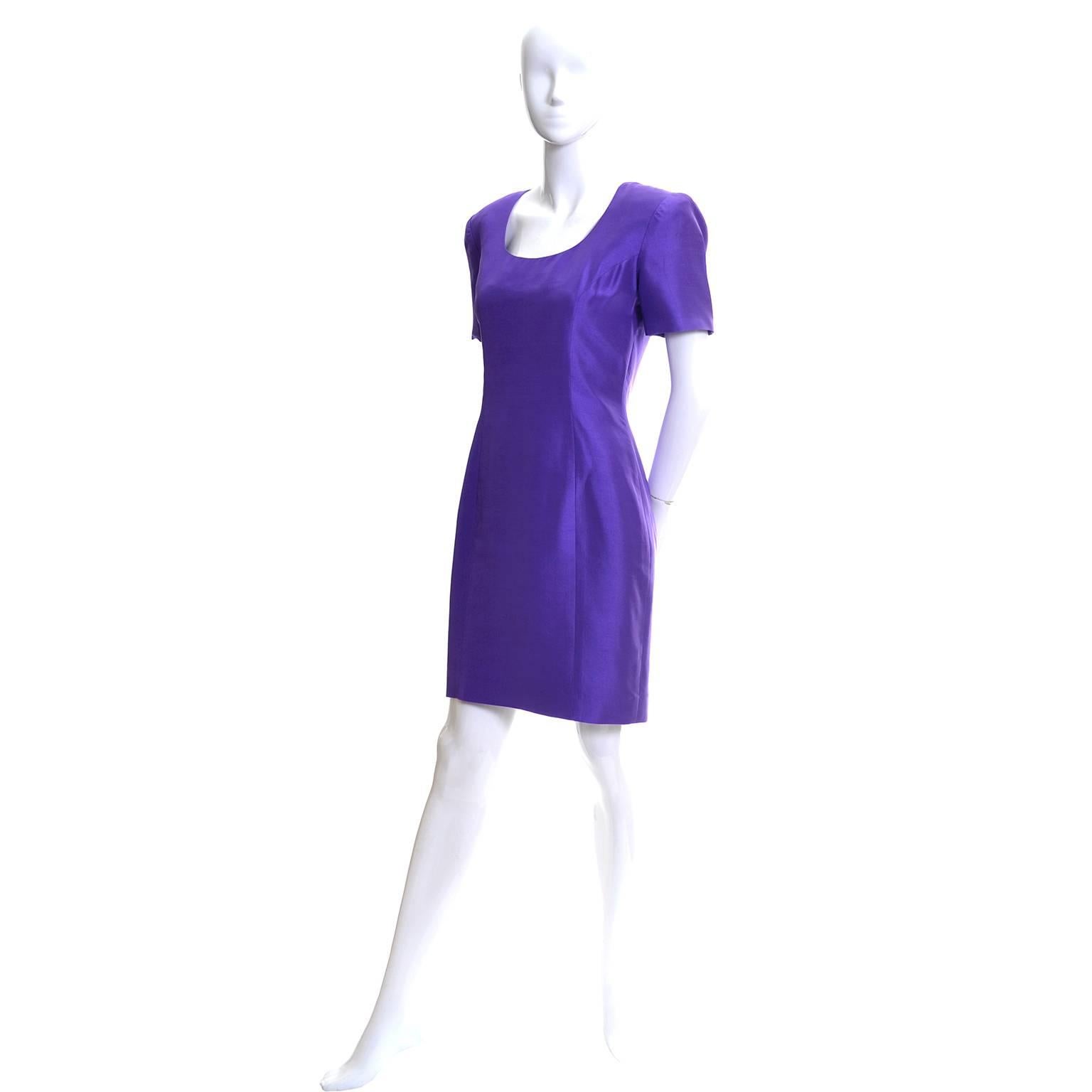 This classic vintage Scaasi dress is from the 1990's and is in as new condition.  This silk purple dress has has a back zipper and is fully lined. The dress is labeled a size 2, but fits more like a size 4 - please use the measurements as a guide