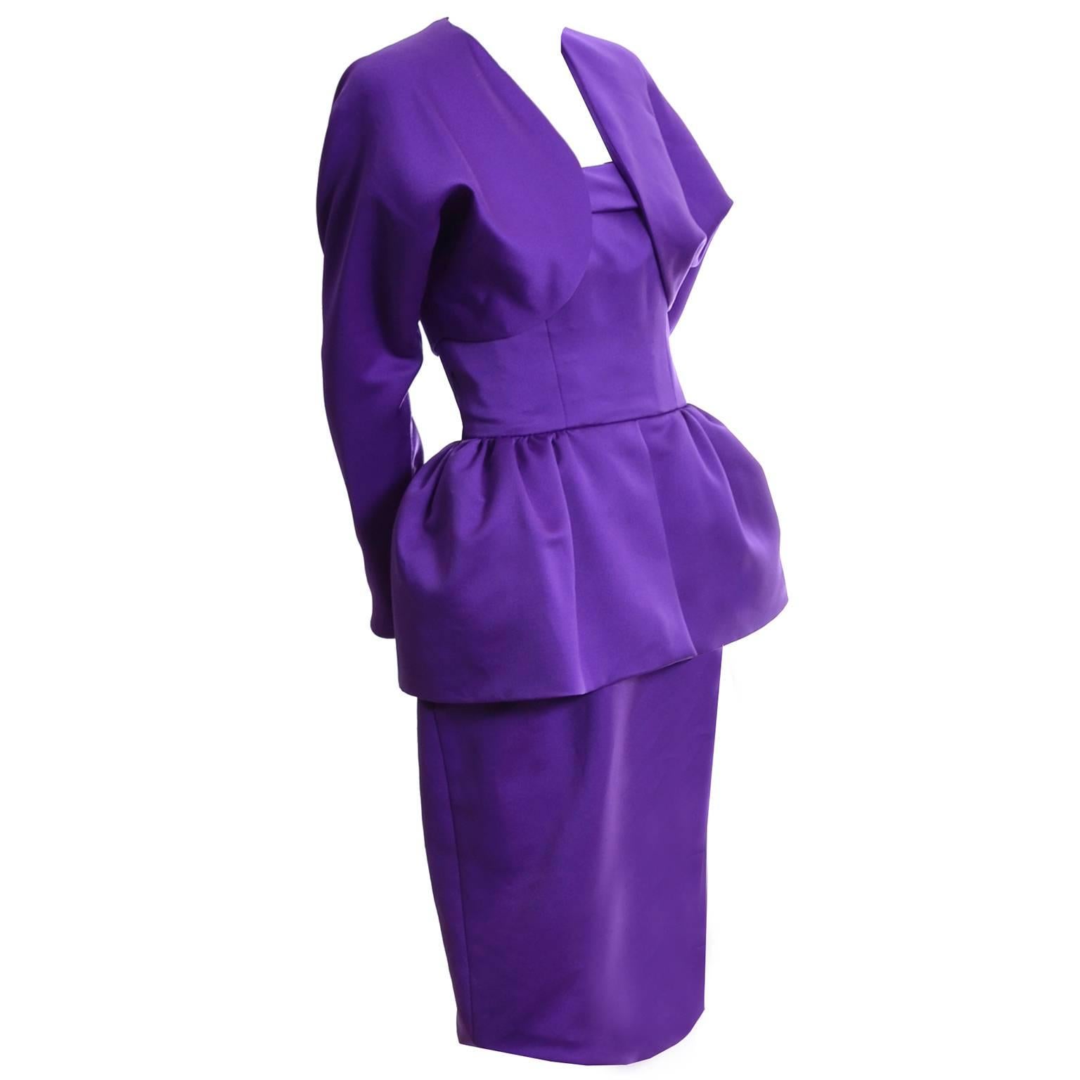 This rich purple satin Victor Costa vintage strapless dress has a tulle lined peplum and separate bolero jacket. The dress has a back zipper and the bolero has long sleeves and is just perfect for cooler evenings!  This 2 piece outfit is in