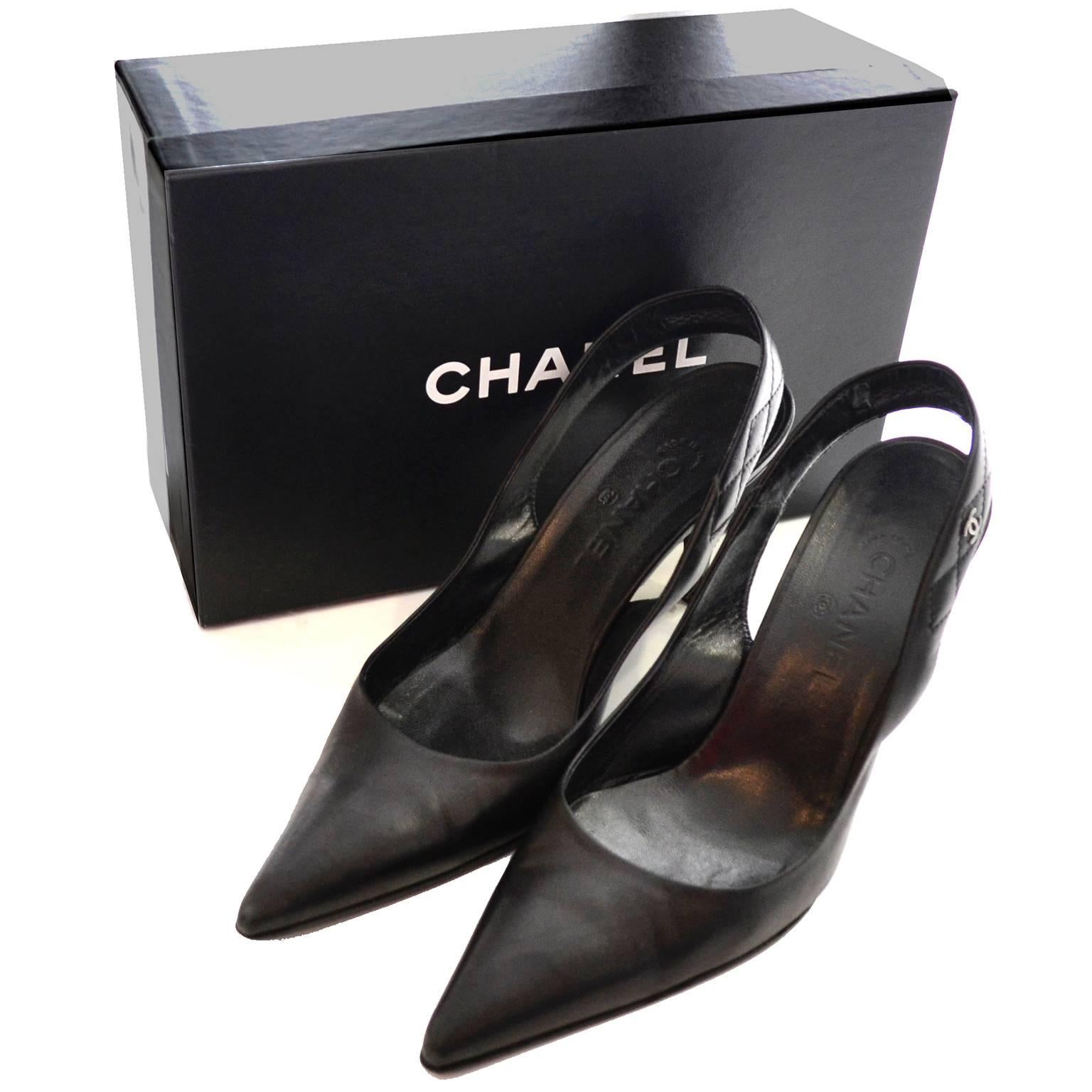 This is a pair of black leather slingbacks from Chanel in their original box. These shoes come with the Chanel envelope with the Karl Lagerfeld mini booklet and a pair of extra heel tips. These were purchased at Saks Fifth Avenue in San Francisco in