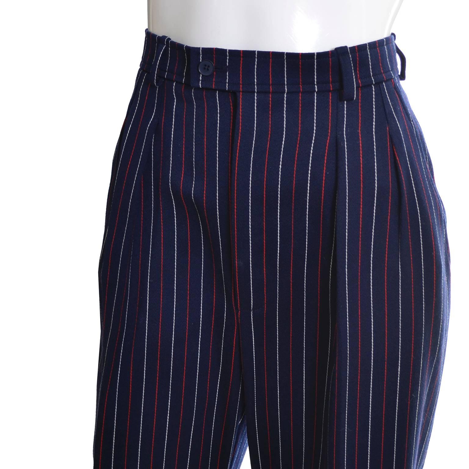 These vintage YSL lightweight fine wool pinstriped pants came from an incredible estate of designer vintage clothing.  The woman who owned these hardly, if ever, wore any of her clothing so most of it was in as new condition, including these pants! 