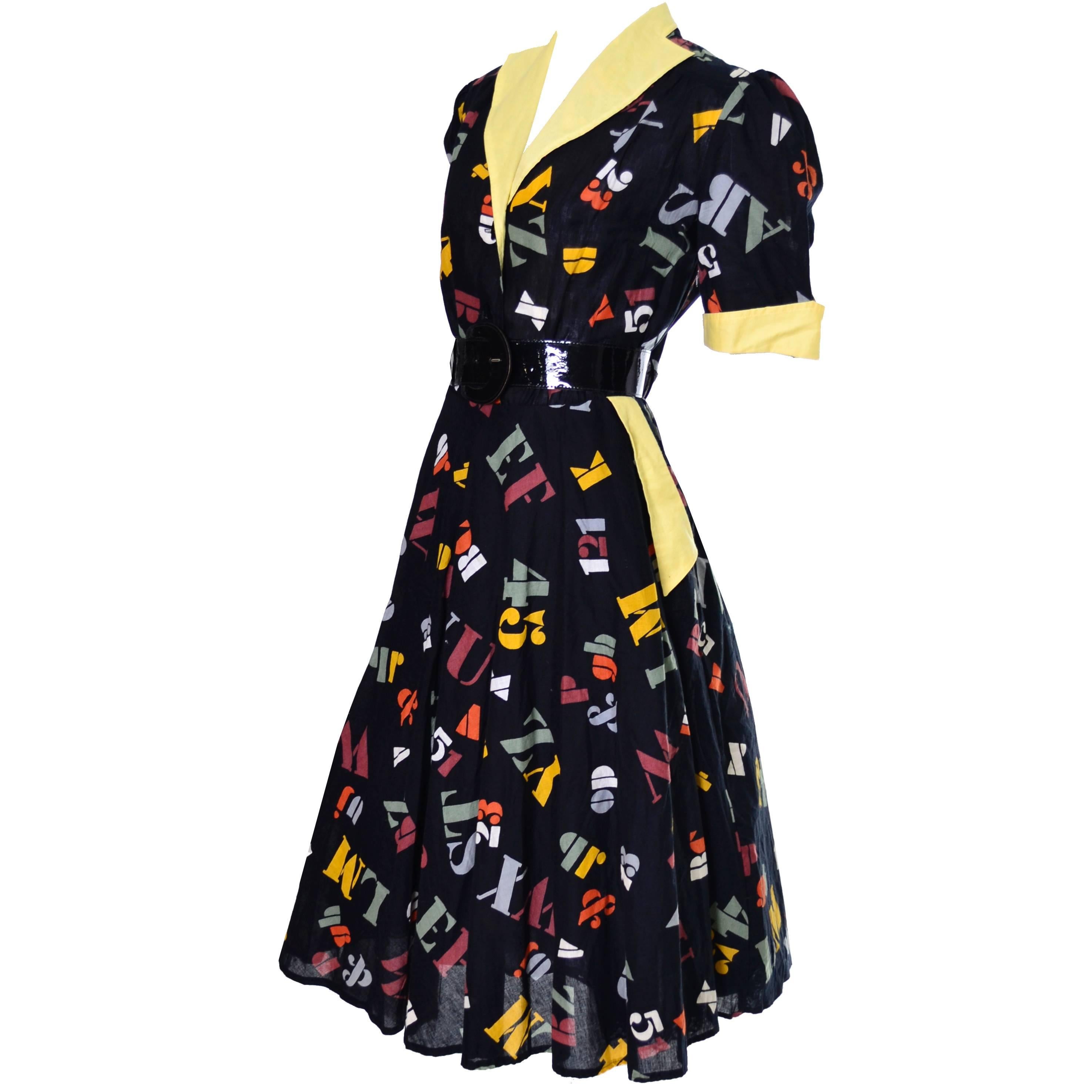 I love this dress! This 1950's vintage dress was made in Germany and the fab fabric includes numbers and all of the letters of the alphabet!  Great for a teacher or anyone who loves 50's novelty prints!  The dress has front buttons, a side zipper, a