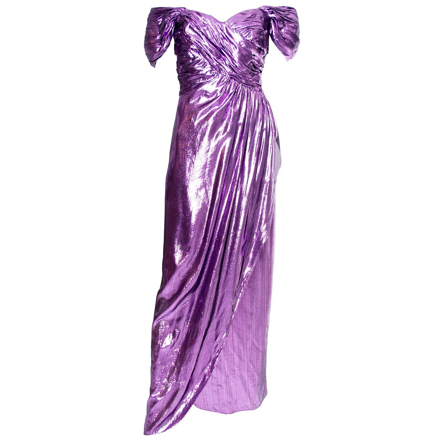 This is one of my favorite Victor Costa dresses! A stunning purple lame vintage evening gown with a beautiful bodice, stays, and sleeves that can be worn either on or off the shoulders.  The dress is in excellent condition, is fully lined, and