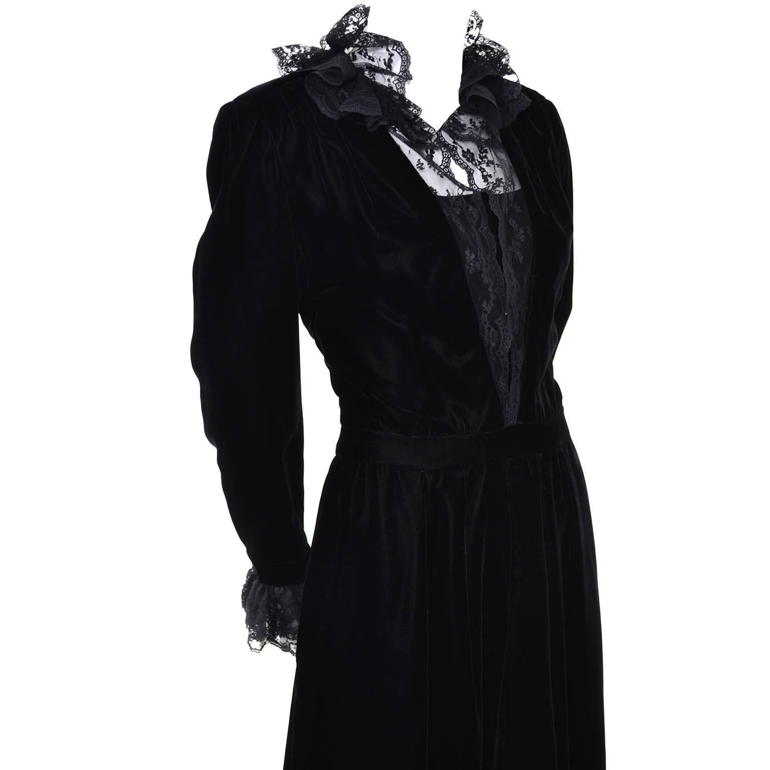 This 1970's vintage Albert Nipon Victorian renaissance evening dress is really amazing.  This  beautiful satin faced black velvet dress has a built in satin and tulle slip underneath.  The bodice, collar and cuffs are trimmed in a lovely black lace