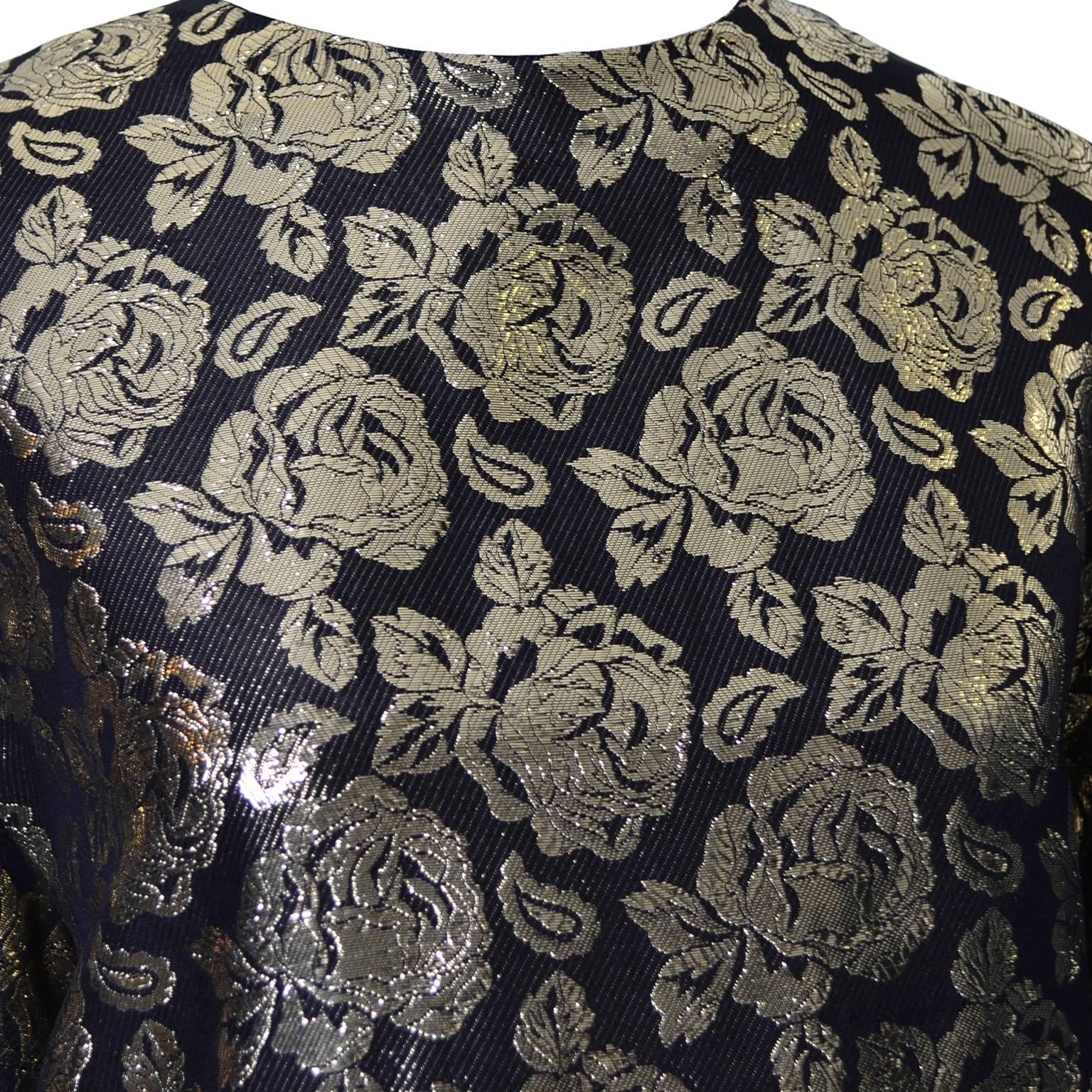This is a beautiful Gloria Sachs black metallic vintage evening blouse with gold metallic roses from the 1980’s and is in excellent condition.  The blouse buttons at the neck in the back and has long sleeves that are slightly gathered at the