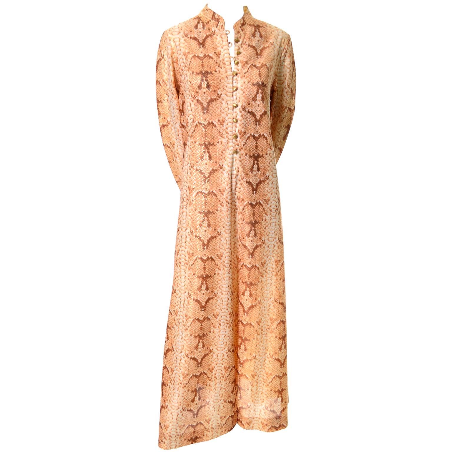 This is a stunning vintage caftan style maxi dress from B. Cohen by Jaconelli that was purchased at I Magnin in the late 1960's or early 1970's.  The fabric is lightweight and the print features a subtle gold bronze metallic python design. There are