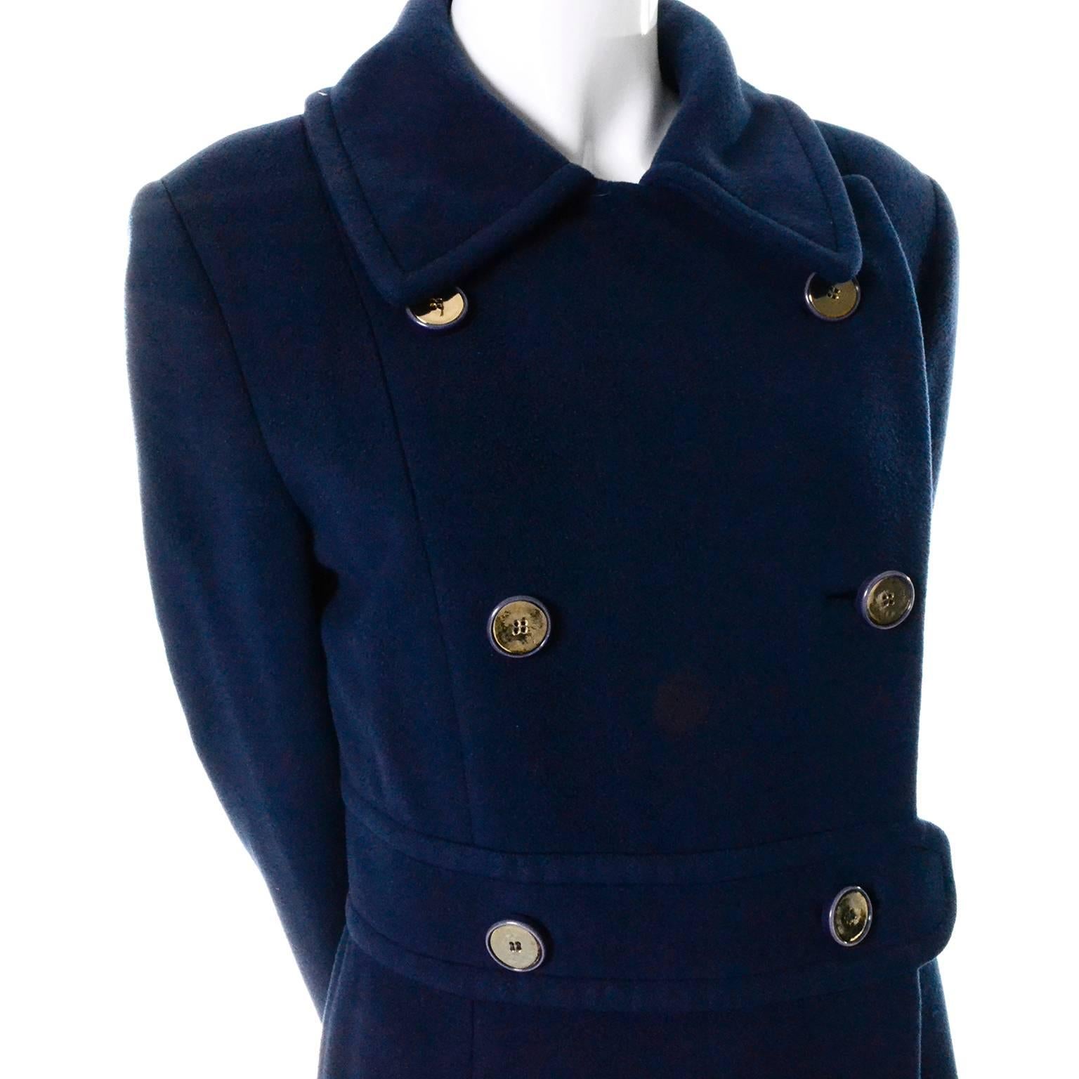 This vintage coat was purchased at I Magnin in the late 1960's or early 1970's and is made of a luxe deep royal blue cashmere.  This double breasted vintage coat has front pockets and is fully lined in blue silk. This is a gorgeous coat and I